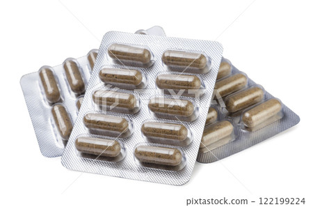 Herbal capsules in plates on white background. Isolated Herbal capsules in plates on white background. Isolated 122199224