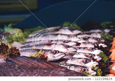 Fresh fish with colorful garnishes Fresh fish with colorful garnishes 122199624