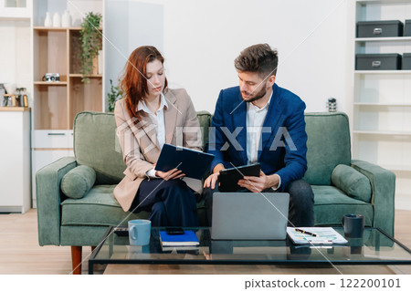 Project manager working and update tasks with milestones progress planning and professional investor working new start up project in the office. Project manager working and update tasks with milestones progress planning and professional investor working new start up project in the office. 122200101