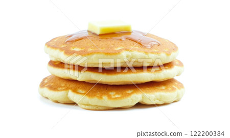 Stack of three fluffy pancakes topped with melting butter and drizzled with syrup, isolated on white background, breakfast or brunch photography, delicious homemade food 122200384