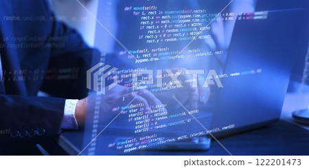 Fictional code reflected on laptop screen with hands typing, symbolizing virtual development space for creative and computational innovation. 122201473