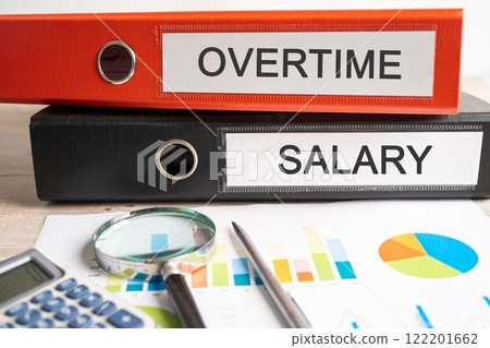 Overtime, Salary. Binder data finance report business with graph analysis in office. 122201662