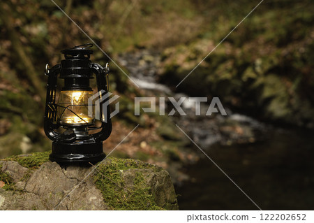 Lantern by the stream, autumn scene 122202652