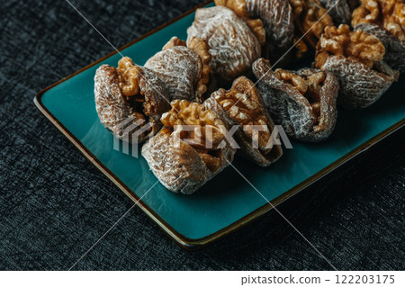 plate with spanish dried figs filled with walnuts plate with spanish dried figs filled with walnuts 122203175