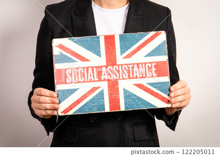 Social Assistance. England flag metal plate in woman's hands Social Assistance. England flag metal plate in woman's hands 122205011