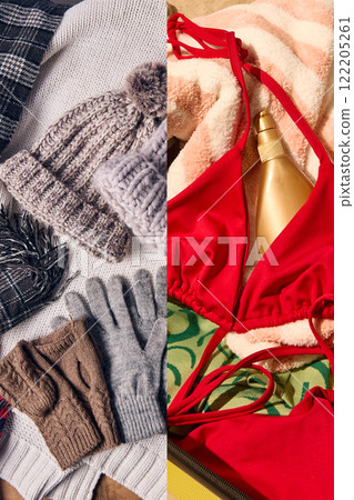 Cozy winter setup with warm knitted hats and gloves contrasting tropical escape with red swimsuit and beach essentials, blending seasons and moods. 122205261