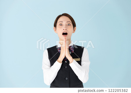 Woman in uniform surprised 122205382