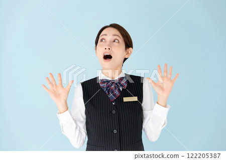 Woman in uniform surprised 122205387