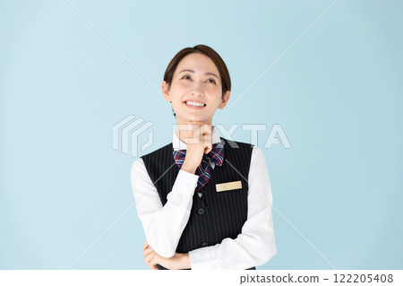 Woman, uniform, thinking, smiling 122205408