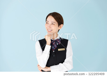 Woman, uniform, thinking, smiling Woman, uniform, thinking, smiling 122205409