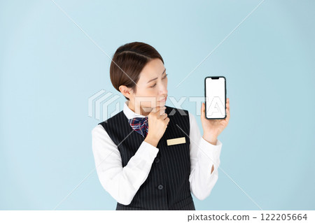 Woman in uniform, smartphone, worries 122205664