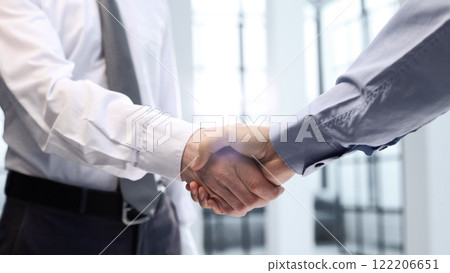Handshake and congratulations after the transaction 122206651