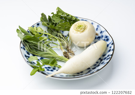 The seven herbs of spring arranged in a Japanese dish on a white background 122207682