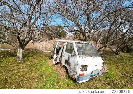 Abandoned vehicle in the mountains 122208236