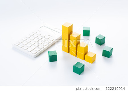 Graph made of yellow building blocks and a calculator Graph made of yellow building blocks and a calculator 122210914