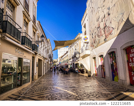 shopping street in the old town 122211685
