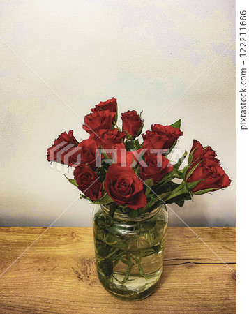 bouquet of red roses in a vase 122211686