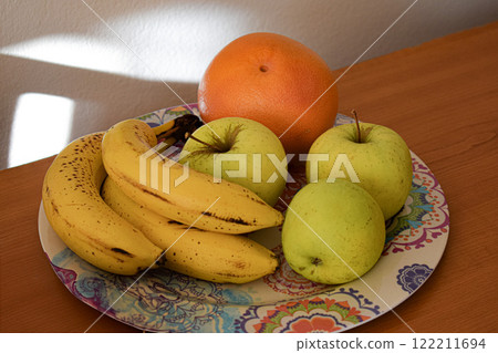 the fruits on a plate the fruits on a plate 122211694