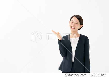 Woman holding her hand on white background 122211848