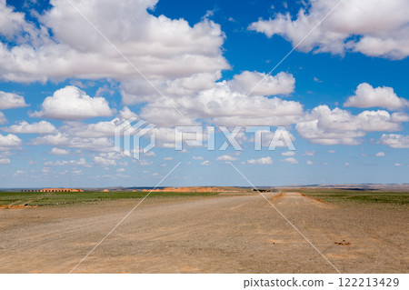 Dirt road in mongolian steppe, Gobi desert landscape, Mongolia Dirt road in mongolian steppe, Gobi desert landscape, Mongolia 122213429