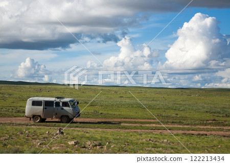 Off-road vehicles in remote region of Mongolia. Gobi desert area Off-road vehicles in remote region of Mongolia. Gobi desert area 122213434