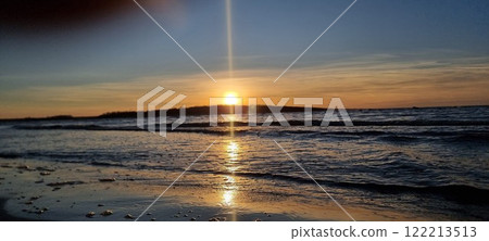 Sunset, on the shores of the Baltic Sea. Riga, Bullupe. 122213513