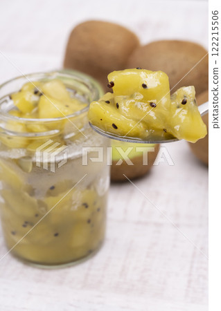Kiwi jam lifted up with a spoon Kiwi confiture lifted up with a spoon 122215506