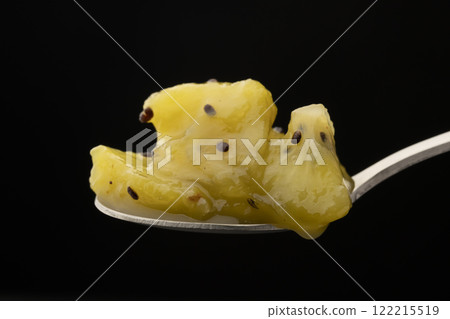 Kiwi jam lifted up with a spoon Kiwi confiture lifted up with a spoon Kiwi jam lifted up with a spoon Kiwi confiture lifted up with a spoon 122215519