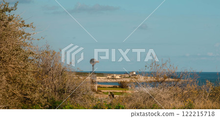 Coastal Windmill with Scenic View of the Sea and Nature Coastal Windmill with Scenic View of the Sea and Nature 122215718