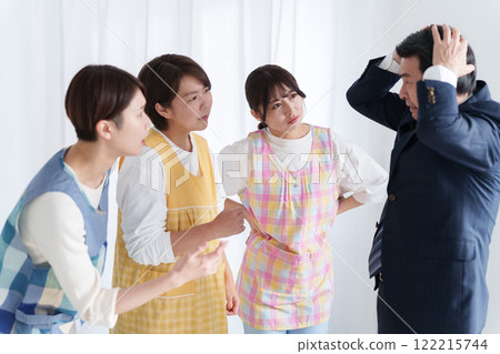 A nursery teacher negotiating salary with the principal 122215744