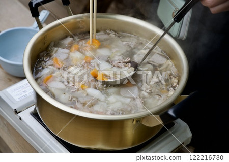 Image of pork soup made in a large pot 122216780