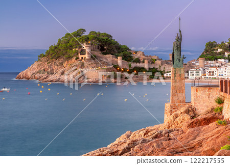 Morning view of the beach and medieval fortress of Tossa de Mar at sunrise, Catalonia, Spain Morning view of the beach and medieval fortress of Tossa de Mar at sunrise, Catalonia, Spain 122217555