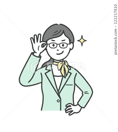 A young woman in a suit holding up her glasses and smiling confidently 122217810