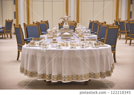 A luxurious dining table at Qasr Al Watan Palace A luxurious dining table at Qasr Al Watan Palace 122218345