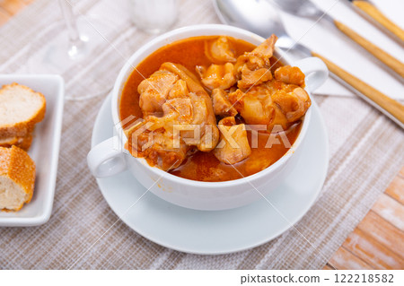 Popular dish of Spanish cuisine is Manos de cerdo 122218582