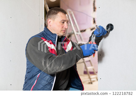 Electrician working with wires in apartment 122218782