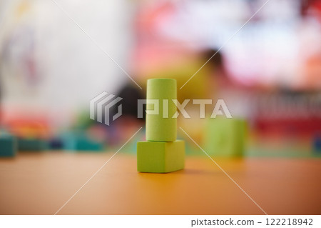 Toy blocks in an indoor children's play area 122218942