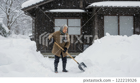Old man removing snow 122219326