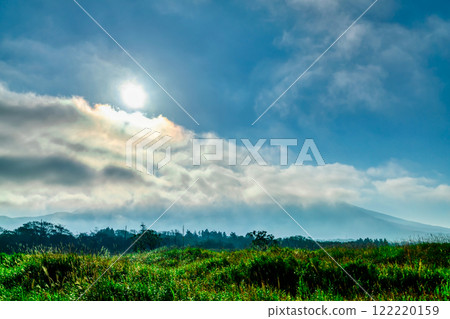 Mount Fuji - The sun hiding behind the fantastic flowing clouds 122220159