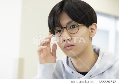 Male students taking classes Male students taking classes 122220752