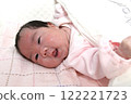 Smiling baby in bed 122221723