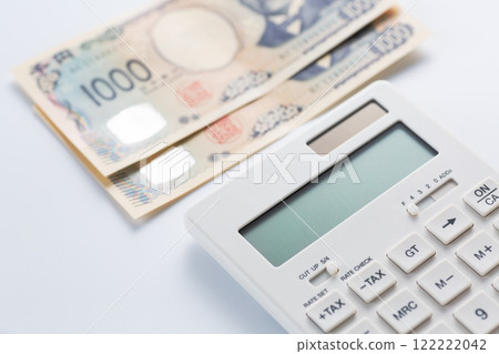 Calculator and 1000 yen bill Calculator and 1000 yen bill 122222042