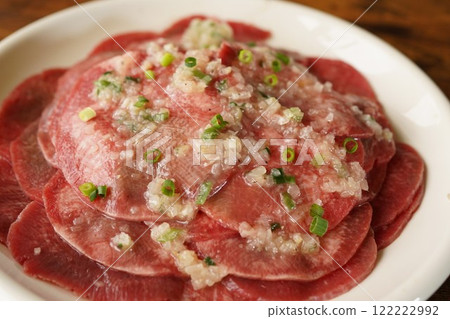 Sliced beef tongue with green onions and salt 122222992