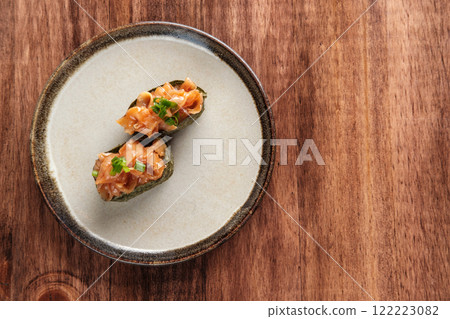 Chopped jellyfish Gunkan Maki on a Round Plate Chopped jellyfish Gunkan Maki on a Round Plate 122223082