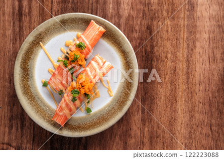 Crab Stick Sashimi with mayonnaise Sauce and Fish Roe Served on a Plate 122223088