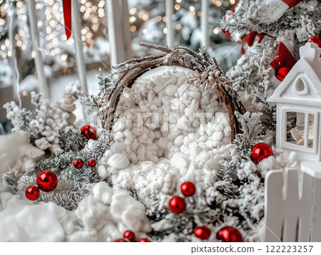 Winter holiday decoration featuring faux snow and festive ornaments in a cozy setting Newborn backdrop Winter holiday decoration featuring faux snow and festive ornaments in a cozy setting Newborn backdrop 122223257