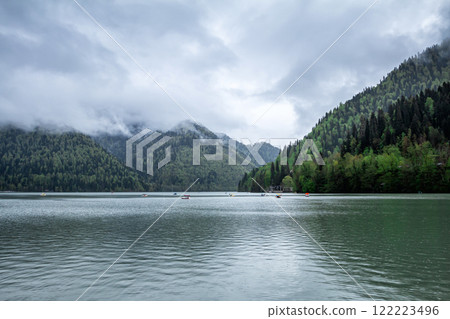 Picturesque mountain lake on a cloudy day Picturesque mountain lake on a cloudy day 122223496