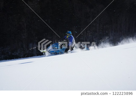 Snowmobile gliding Snowmobile gliding 122223896
