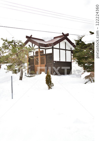 Photographing the grounds of Atsuta Shrine in Yakumo, Hokkaido in winter 122224360