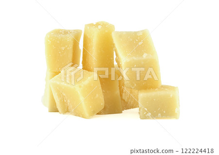 Parmesan cheese cubes forming a pile on white background Parmesan cheese cubes forming a pile on white background 122224418